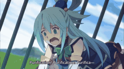 Aqua crouched inside a steel cage sitting in a lake, frantically chanting "Purification! Purification! Purifica—" while the cage shakes around her.